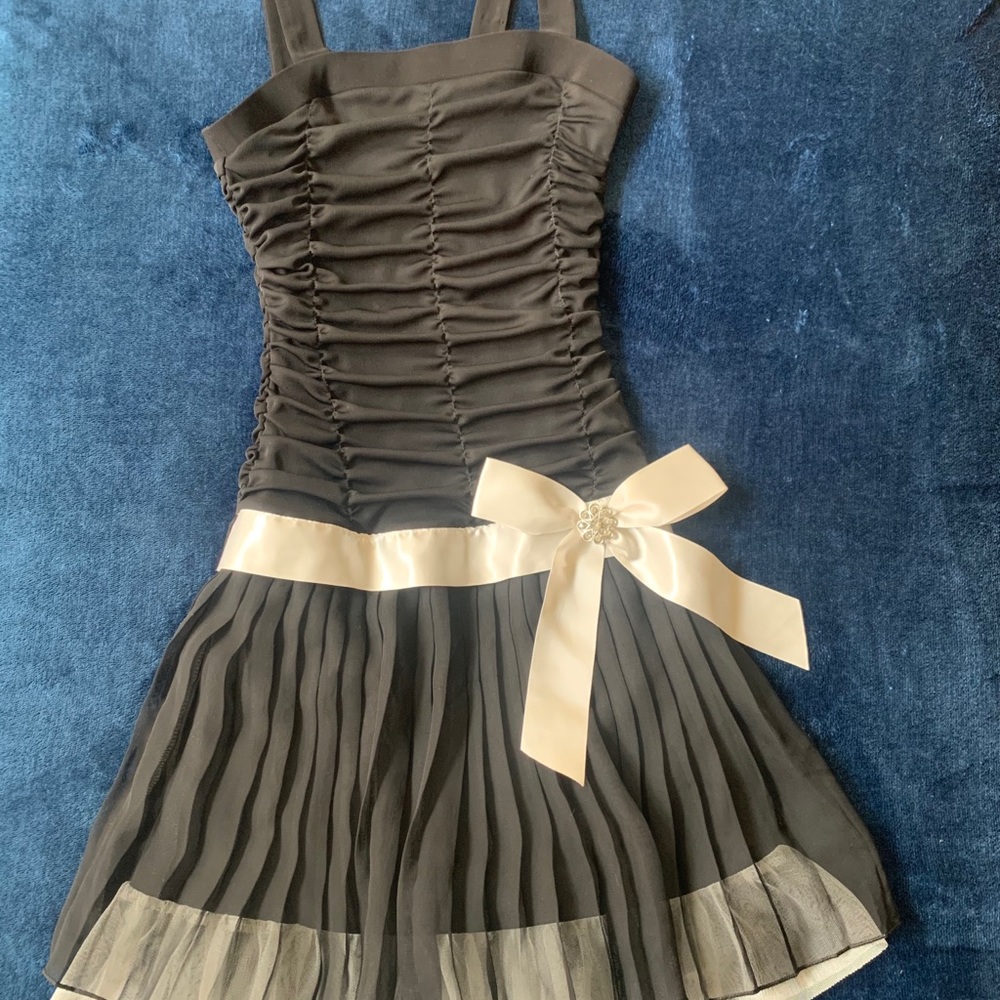 BCC Girl Elegant girls black dress with white bow.